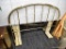 QUEEN SIZE BRASS HEADBOARD; BRASS HEADBOARD WITH BRASS SPINDLED BACK. MEASURES 60 IN X 52 IN. IN