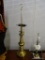 BRASS TABLE LAMP; FEATURES A ROUND, BEVELED BASE WITH A TURNED STYLE BODY. FEATURES DOUBLE BULBS,