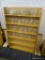 MULTIPURPOSE WOODEN DISPLAY SHELF; 6 SHELVES WITH A NATURAL WOOD FINISH. MATCHES LOTS # 34, 48, 78,