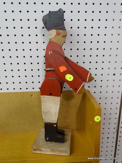 WOODEN PRIMITIVE SOLDIER; HAND PAINTED SOLDIER WEARING BLACK BOOTS, RED AND WHITE SUIT. HANDCRAFTED