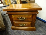 WOODEN NIGHT STAND; FEATURES A RECTANGULAR TOP, TWO BEVELED FACE DRAWERS WITH OVERSIZED BRASS BAIL