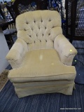 STATE OF NEWBURGH ARM CHAIR; YELLOW VELVET UPHOLSTERED ARM CHAIR FEATURING A CURVED, TUFTED BACK AND