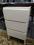 THREE DRAWER CABINET; WHITE CABINET WITH THREE FLAT FACE DRAWERS. IS MISSING TOP, BUT WOULD MAKE A