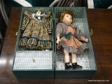 DOLL CASE WITH DOLL AND ACCESSORIES; GREEN CASE WITH BRASS CLASP THAT OPENS TO REVEAL A RIGHT SIDE