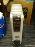 SEARS RADIATOR HEATER; FEATURES MULTIPLE POWER SETTINGS AND A 10 SETTING TEMPERATURE DIAL. MEASURES