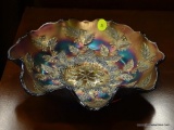 RAINBOW CARNIVAL PRESSED GLASS BOWL. FEATURES DESIGN OF RAISED LEAVES & BERRIES. MEASURES 9 IN