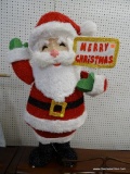 SANTA YARD DECORATION; PRE-LIT YARD DECORATION DEPICTING A WAVING SANTA HOLDING A SIGN THAT READS