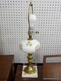 FLORAL TABLE LAMP; FEATURES A SQUARE MARBLE BASE, BRASS FIXTURES, AND A PORCELAIN MIDDLE PAINTED