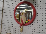 WALL MIRROR WITH HAND CRAFTED PARROT; SIDE PORTRAIT OF A PARROT WITH A FEATHERED TAIL. MIRROR HAS A