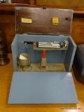 VINTAGE OHAUS CENT-O-GRAM SCALE; WEIGHING CAPACITY OF 311 GRAMS. PAN DIAMETER IS 3 3/8 IN. DIE-CAST