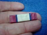 US Army Distinguished Service Medal Ribbon Bar Has slip-on unimount reverse. Condition is excellent.