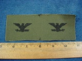 Original 1970s US Army Subdued Colonel Rank Eagles on OG Uniform Cloth . Original uncut pair of