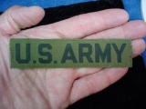 #14 US ARMY Black on OG Olive Green Woven Service Name Uniform Tape #14 . Previously used U.S. ARMY