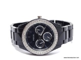 LADIES FOSSIL DAY/DATE WATCH; BEAUTIFUL LADIES ES-2157 FOSSIL WATCH. BLACK ABS BAND WITH BLACK