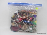 BAG LOT OF COSTUME JEWELRY; BAG LOT CONTAINING ASSORTED BRACELETS AND NECKLACES.