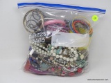 BAG LOT OF COSTUME JEWELRY; BAG LOT CONTAINING ASSORTED BRACELETS, AND NECKLACES.