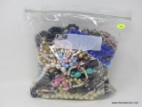 BAG LOT OF COSTUME JEWELRY; BAG LOT CONTAINING ASSORTED NECKLACES.