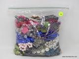 BAG LOT OF COSTUME JEWELRY; BAG LOT CONTAINING ASSORTED NECKLACES.