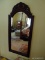 (DBR) MAHOGANY MIRROR; FLORAL CARVED CREST MAHOGANY MIRROR- 27 IN X 56 IN