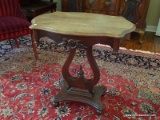 (LR) VICTORIAN SIDE TABLE; ROSE CARVED WALNUT SIDE TABLE WITH LYRE STYLE BODY AND BALL FEET. IS IN