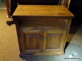 (BAS) ENTERTAINMENT STAND; PINE 2 DOOR ENTERTAINMENT STAND WITH AN OPEN STORAGE AREA. MEASURES 31 IN