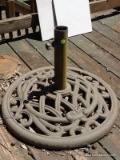 (OUT) METAL UMBRELLA STAND; MEASURES 24 IN DIA.