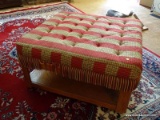 (FAM) OTTOMAN; OVERSIZED UPHOLSTERED AND OAK OTTOMAN WITH TASSELED EDGING. IS IN EXCELLENT CONDITION