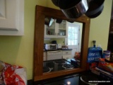 (KIT) THIS END UP MIRROR; PINE FRAMED THIS END UP STYLE MIRROR. IN VERY GOOD CONDITION! MEASURES 28