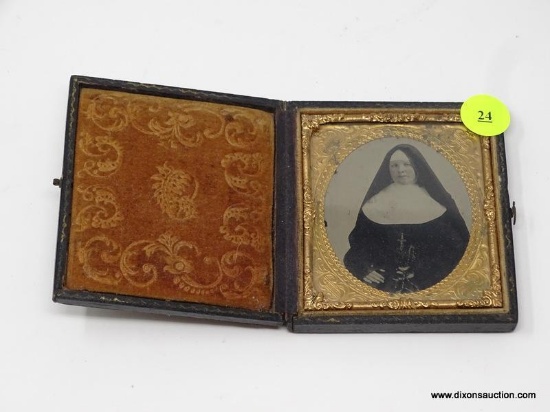 ANTIQUE TINTYPE; SIXTH PLATE SIZE AND IS TITLED "NUN" WITH A WIDE WIMPLE. IS IN EXCELLENT CONDITION.