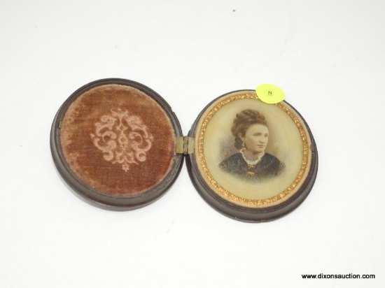 ANTIQUE IVORY PAINTED PHOTO; MEASURES 3" X 3.75" (OVAL) AND IS TITLED "HAND PAINTED IVORY". IS IN