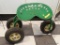 ROLLING STOOL; GREEN AND WHITE COLORED ROLLING STOOL WITH A VINTAGE TRACTOR STYLE SEAT. GREAT FOR