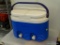 IGLOO COOLER; DOUBLE SPOUT IGLOO COOLER IN BLUE AND WHITE. HAS A SINGLE HANDLE. MATCHES #199