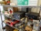 SHELF LOT; INCLUDES A CAULK GUN, A CEILING LIGHT HOLDER, A BRAND NEW BOX OF RACK SACK BAGS, AND