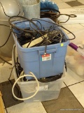 LOT OF ASSORTED CABLES; 2 TOTE LOT OF ASSORTED CABLES, POWER STRIPS, WIRING, AND MORE!