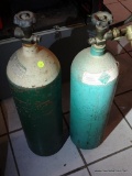 WELDING LOT; INCLUDES 2 COMPRESSED ARGON TANKS. AMOUNT OF CONTENTS ARE UNKNOWN. MEASURE 35 IN TALL.