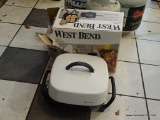 WEST BEND 12 IN. ELECTRIC SKILLET; COMES WITH BOX & POWER CORD. IN GOOD USED CONDITION.