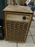 VINTAGE AIR KING DEHUMIDIFIER; WOOD-PATTERNED METAL BODY, 21 IN X 12 IN X 12.5 IN. SOLD AS-IS.