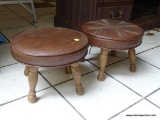 PAIR OF MID CENTURY PADDED FOOT STOOLS; ROUND VINYL TOPS SUPPORTED BY FOUR WOODEN FEET. THEY MEASURE
