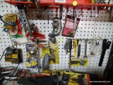 PARTIAL WALL LOT; INCLUDES A 2 IN DIA TOW BALL, STAPLES, A CHALK LINE, ETC.