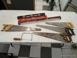 ASSORTED TOOL LOT; INCLUDES 4 LEVELS, AND 3 HANDSAWS.