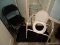 (BTH1) REMAINING CONTENTS OF BATHROOM; INCLUDES A HANDICAP SHOWER CHAIR, A METAL AND WIRE CORNER