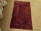 (BR1) AREA RUG; 1 OF A PAIR OF MAROON COLORED AREA RUGS IN VERY GOOD CONDITION. MEASURES 2 FT X 3 FT