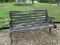 (OUT) PARK BENCH; 1 OF A PAIR OF CAST IRON AND WOOD PARK STYLE BENCHES WITH FLORAL MOTIF. IS IN