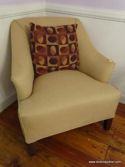 (LR) ARM CHAIR; BEIGE UPHOLSTERED ARM CHAIR WITH MAHOGANY LEGS AND A BROWN OVAL PATTERN ACCENT