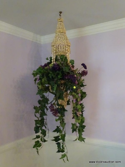 (LR) SHELL HANGING PLANTER; HAS AN ARTIFICIAL PLANT WITH PURPLE FLOWERS. MEASURES APPROXIMATELY 5 FT