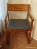 (BR1) ARM CHAIR; OAK ARM CHAIR WITH VINYL UPHOLSTERED SEAT. IS IN EXCELLENT CONDITION AND MEASURES 1