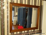 (BR2) FRAMED MIRROR; MAHOGANY FRAMED MIRROR IN EXCELLENT CONDITION. MEASURES 3 FT 5 IN X 2 FT 9 IN