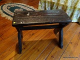 (BR2) ANTIQUE STOOL; HAS SQUARE NAIL CONSTRUCTION AND IS MADE OF PINE. MEASURES 2 FT X 11 IN X 1 FT