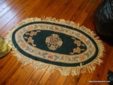 (BR2) OVAL AREA RUG; ROYAL AUBUSSON STYLE AREA RUG IN HUES OF GREEN, PINK, AND CREAM. IS IN VERY