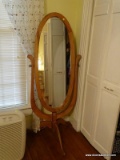 (MBR) CHEVAL MIRROR; OAK MIRROR WITH TRI-LEGGED BASE. MEASURES 2 FT 3 IN X 5 FT 4 IN